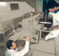 men working on BMF equipment